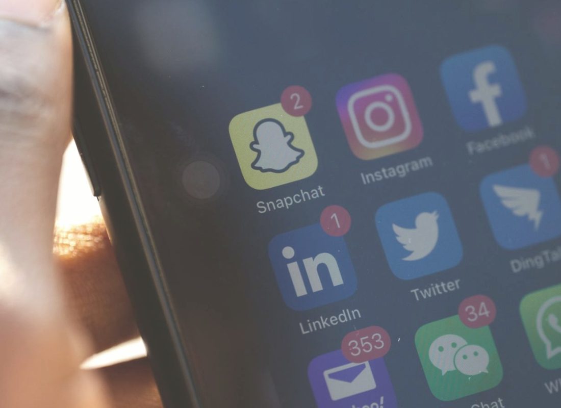 Smartphone screen showing social media apps