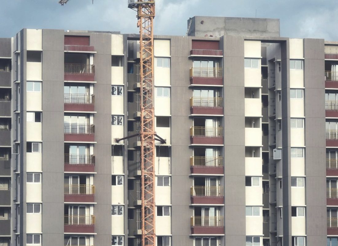 Tower crane over a new apartment building under construction