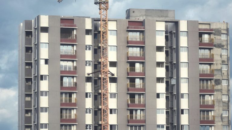 Tower crane over a new apartment building under construction